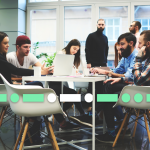 group of students in a classroom working